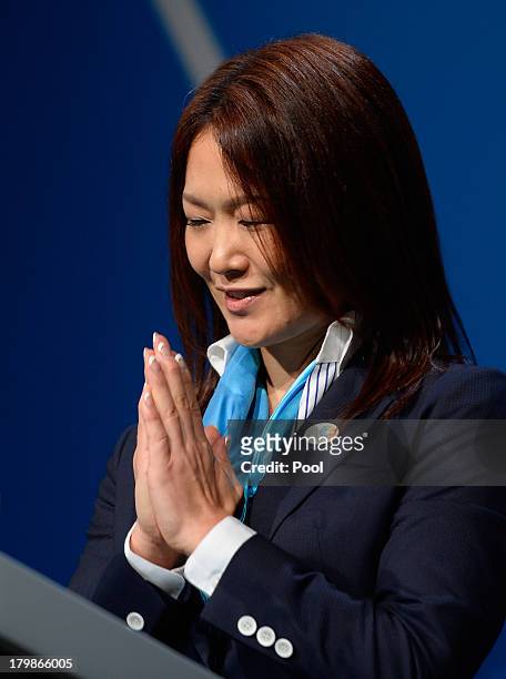Paralympian Mami Sato gestures during Tokyo's bid presentation before the International Olympic Committee members during a IOC session on September...