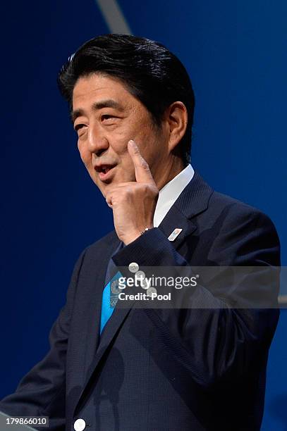 Japanese Prime Minister Shinzo Abe speaks during Tokyo's bid presentation before the International Olympic Committee members during a IOC session on...