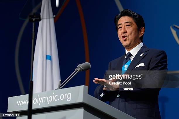 Japanese Prime Minister Shinzo Abe speaks during Tokyo's bid presentation before the International Olympic Committee members during a IOC session on...