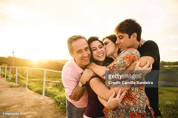 happy family was smiling and embracing - mutter sohn erwachsen stock-fotos und bilder