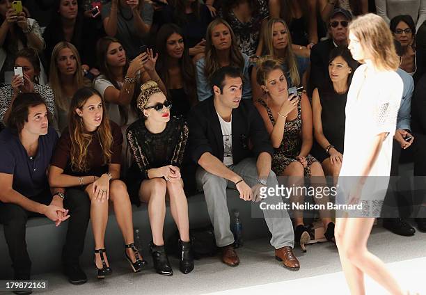 Nicholas Cinque, Chloe Curtis, Casey LaBow, Mohammed Al Turki, Sophie Curtis and Perrey Reeves attend the Jill Stuart Spring 2014 fashion show during...