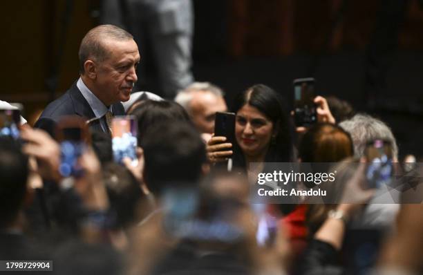 Turkish President Recep Tayyip Erdogan attends the premiere of 'Aybuke: I Became a Teacher' as they watch the movie with family members of Senay...