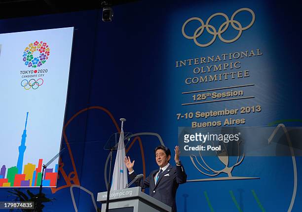 Japanese Prime Minister Shinzo Abe speaks during their presentation before the International Olympic Committee members during an IOC session on...