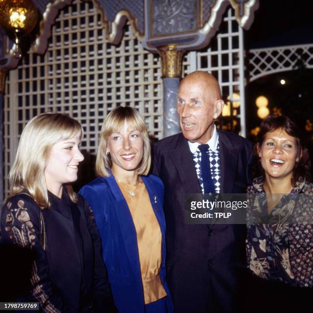 Portrait of fashion designer Ted Tinling and tennis players, from left, Chris Evert, Martina Navratilova, and Evonne Goolagong at a celebration of...