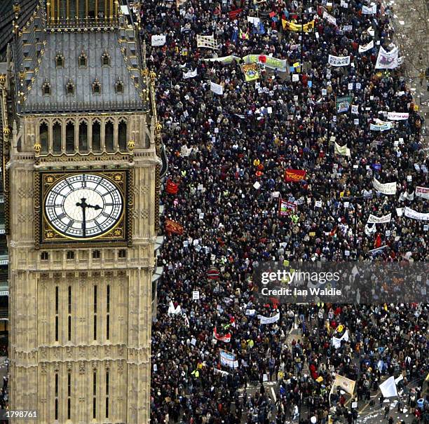 activists in london rally for peace - marching stock pictures, royalty-free photos & images