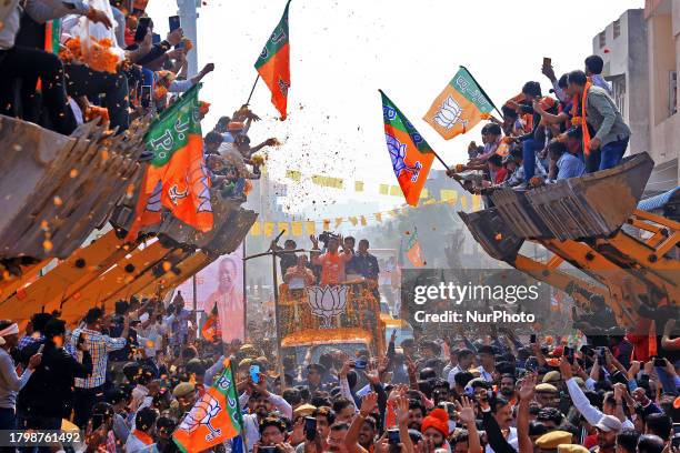 Uttar Pradesh Chief Minister Yogi Adityanath is participating in a roadshow aboard a bulldozer in support of BJP candidate Rajyavardhan Singh Rathore...