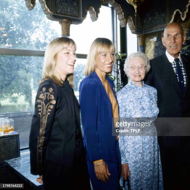 Portrait of tennis players, from left, Chris Evert, Martina Navratilova, Kathleen McKane , and fashion designer Ted Tinling at a celebration of the...