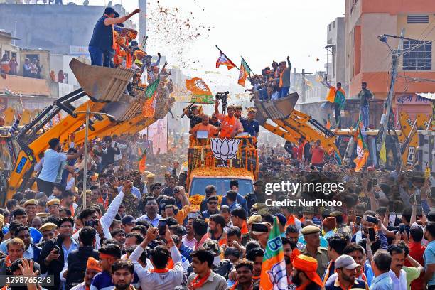 Uttar Pradesh Chief Minister Yogi Adityanath is participating in a roadshow aboard a bulldozer in support of BJP candidate Rajyavardhan Singh Rathore...