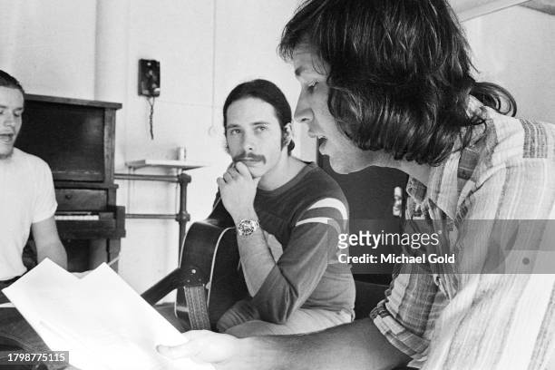 From the cast of 'Lemmings,' Christopher Guest, Paul Jacobs and Chevy Chase, rehearsing in a rehearsal hall in New York City, circa 1973.