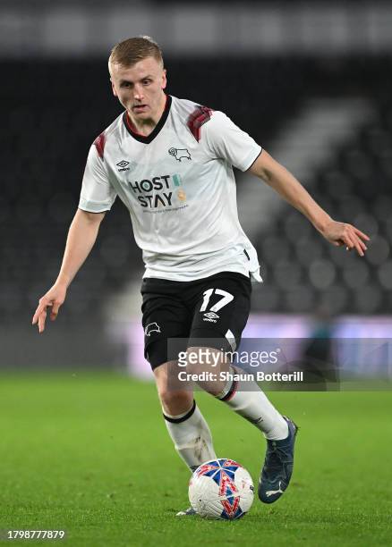 Louie Sibley of Derby County runs with the ball during the Emirates FA Cup First Round Replay match between Derby County and Crewe Alexandra at Pride...