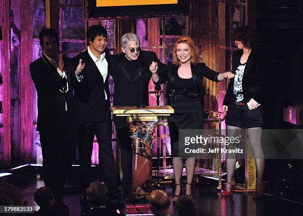 Jimmy Destri, Clem Burke, Chris Stein and Debbie Harry of Blondie, inductees, with presenter Shirley Manson