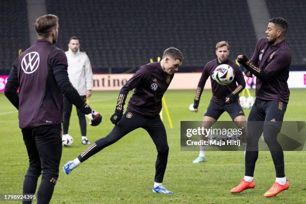 Florian Wirtz and Benjamin Henrichs during a training of Germany's national football team at Olympiastadion on November 17, 2023 in Berlin, Germany....