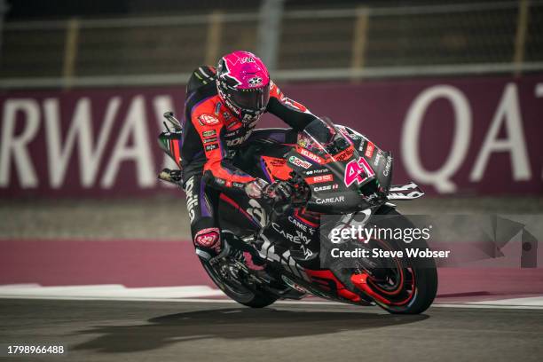 Aleix Espargaro of Spain and Aprilia Racing brakes into turn one with glowing disc brake during the free practice of the MotoGP Qatar Airways Grand...