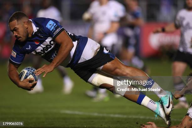 Ollie Lawrence of Bath scores his sides opening try during the Gallagher Premiership Rugby match between Bath Rugby and Bristol Bears Rugby at The...