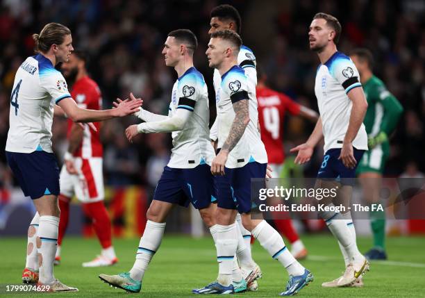 Phil Foden, Conor Gallagher, Kieran Trippier, Marcus Rashford and Jordan Henderson of England celebrate the team's first goal, an own goal by Enrico...