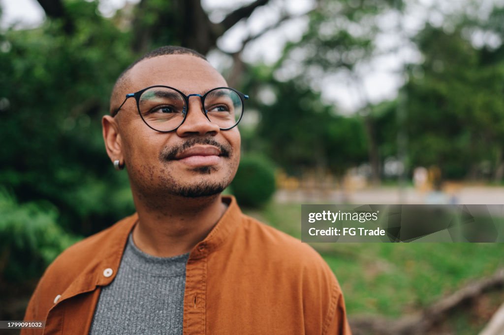 Contemplative mid adult man looking away outdoors