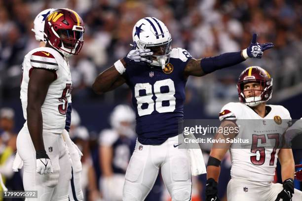 CeeDee Lamb of the Dallas Cowboys signals for a first down after a play during the second quarter of an NFL football game against the Washington...