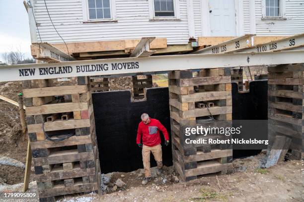 House built in 1810 sits on blocks as its foundation and wooden structure are rebuilt by Jonathan McGuire, C, November 17, 2023 in East Charlotte,...