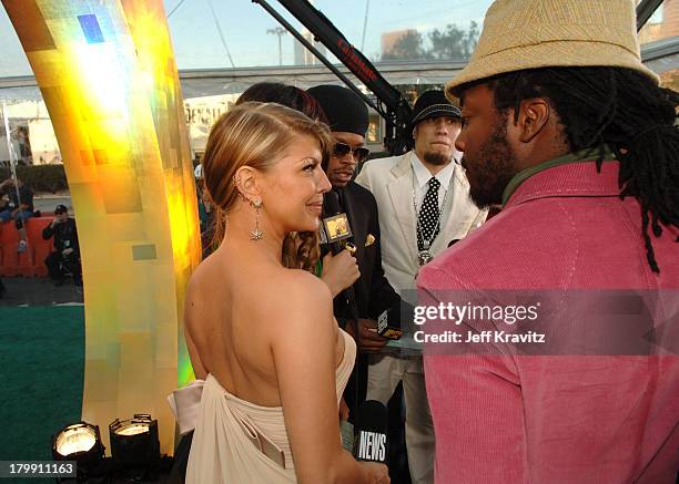 Fergie and wil.i.am of Black Eye Peas during The 48th Annual GRAMMY Awards - Green Carpet at Staples Center in Los Angeles, California, United States.