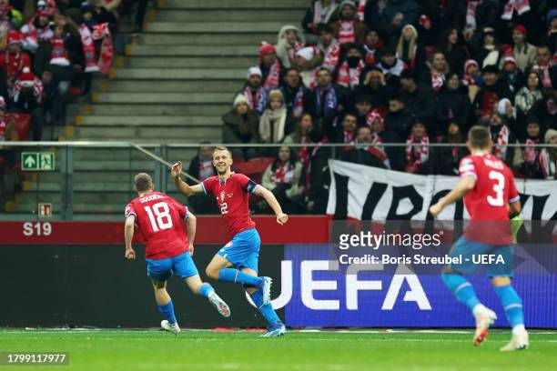 Tomas Soucek of Czechia celebrates with teammate David Doudera after scoring the team's first goal during the UEFA EURO 2024 European qualifier match...