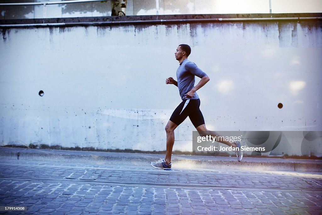 A man running in the city.