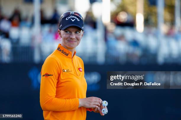 Madelene Sagstrom of Sweden smiles on the 18th green during the second round of the CME Group Tour Championship at Tiburon Golf Club on November 17,...