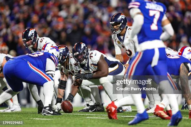 Lloyd Cushenberry of the Denver Broncos sets up during an NFL football game against the Buffalo Bills at Highmark Stadium on November 13, 2023 in...