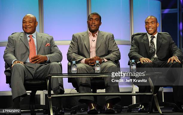 Former Boxing Champion George Foreman, George Monk Foreman III and George Foreman IV of Family Foreman speaks during the 2008 Summer Television...