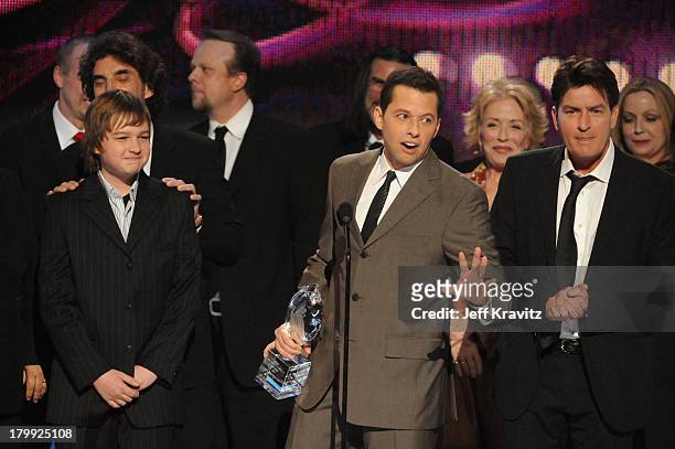 Actors Angus T. Jones, Jon Cryer, Charlie Sheen and cast members accept the Favorite TV Comedy award for Two and a Half Men at the 35th Annual...