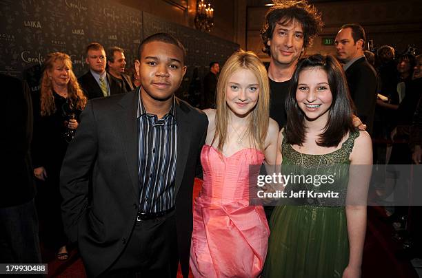 Robert Bailey Jr, Dakota Fanning and Neil Gaiman and Maddy Gaiman at The Premiere of Coraline Presented By Focus Features on February 5, 2009 in...