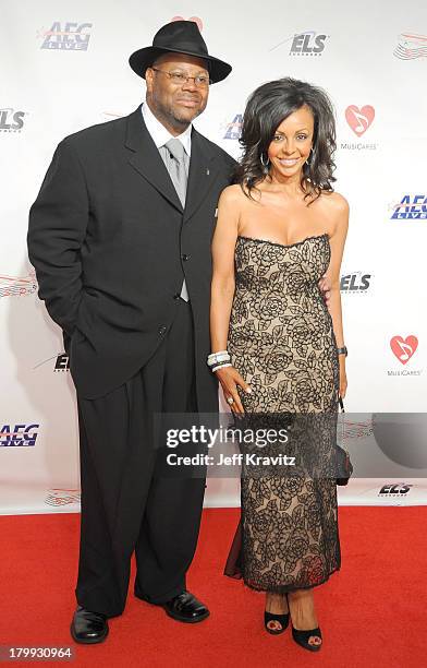 Producer Jimmy Jam and his wife Lisa Padilla arrives at the 2009 MusiCares Person of the Year Tribute to Neil Diamond at the Los Angeles Convention...