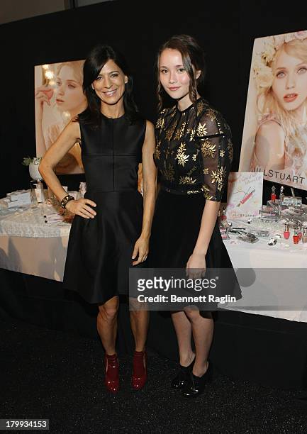 Actors Perrey Reeves and Katie Chang attends the Jill Stuart show during Spring 2014 Mercedes-Benz Fashion Week at The Stage at Lincoln Center on...