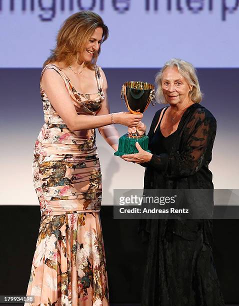 Jury Member Martina Gedeck presents on stage the Best Actress Award to actress Elena Cotta which she received for her role in the movie 'Via...