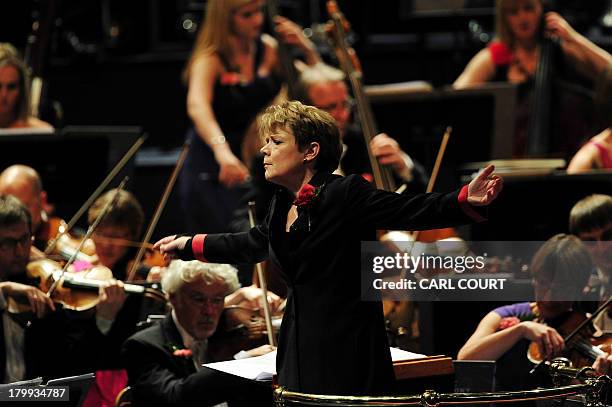 Conductor Marin Alsop conducts the orchestra at the Royal Albert Hall in west London on September 7, 2013 during the Last Night of the Proms. Marin...