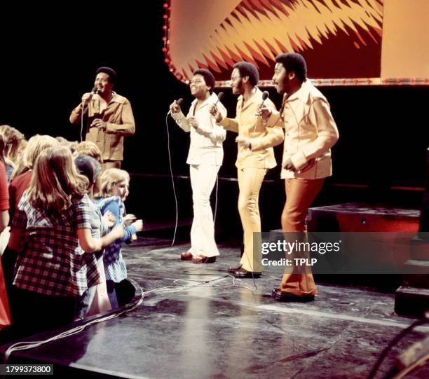 American musicians Levi Stubbs , Renaldo "Obie" Benson , Abdul Duke Fakir and Lawrence Payton , of the American vocal quartet The Four Tops perform...