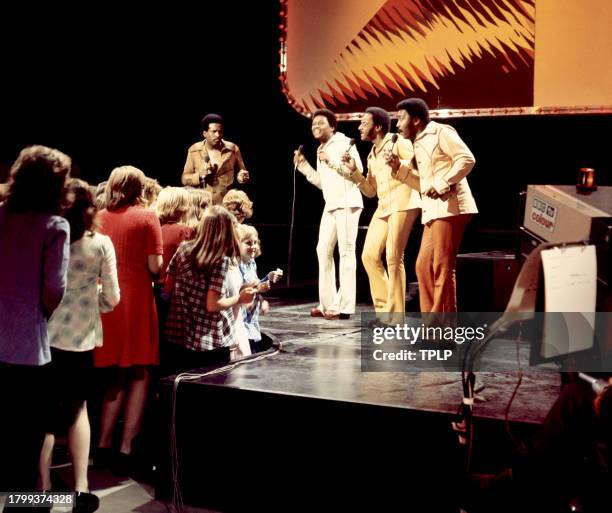 American musicians Levi Stubbs , Renaldo "Obie" Benson , Abdul Duke Fakir and Lawrence Payton , of the American vocal quartet The Four Tops perform...