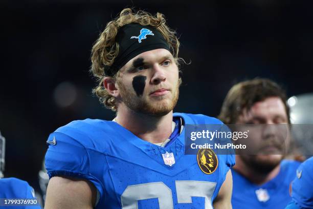 Detroit Lions defensive end Aidan Hutchinson warms up before an NFL football game between the Green Bay Packers and the Detroit Lions in Detroit,...