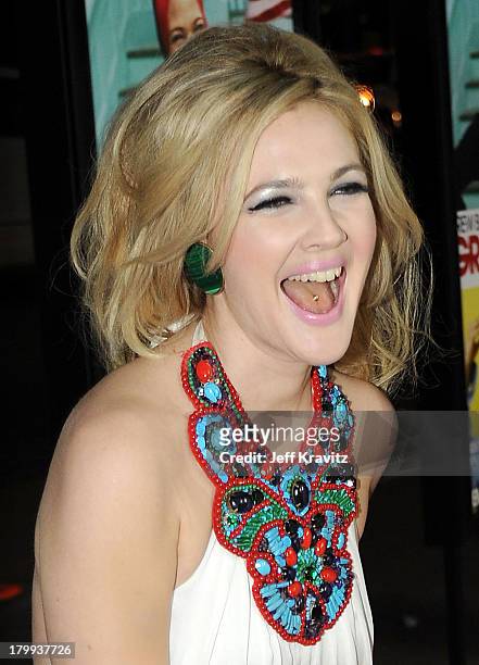 Actress Drew Barrymore shows off her tongue ring at the premiere of HBO Films' Grey Gardens held at Grauman's Chinese Theatre on April 16, 2009 in...