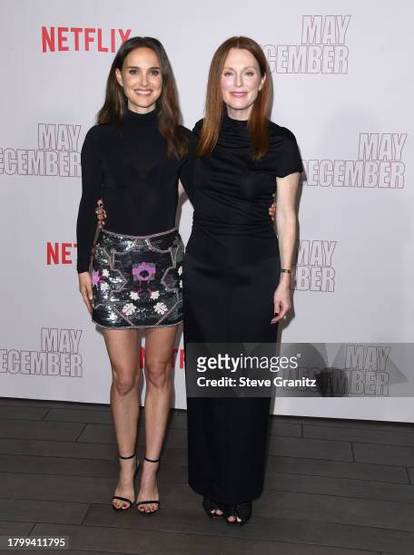 Natalie Portman and Julianne Moore pose at the Netflix's "May December" Los Angeles Photo Call at Four Seasons Hotel Los Angeles at Beverly Hills on...