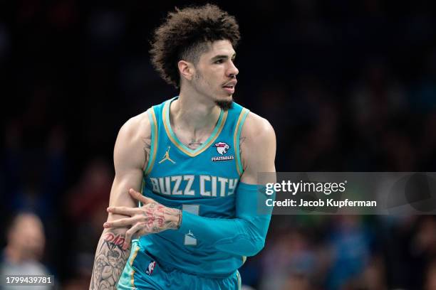 LaMelo Ball of the Charlotte Hornets reacts after scoring a basket in the first quarter during an NBA In-Season Tournament game against the Milwaukee...