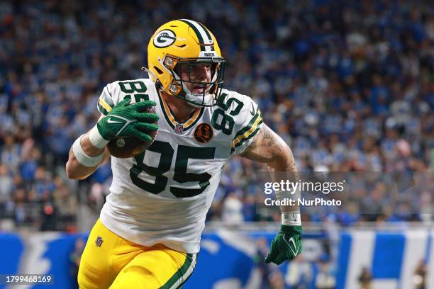 Green Bay Packers tight end Tucker Kraft runs the ball during the first half of an NFL football game between the Green Bay Packers and the Detroit...