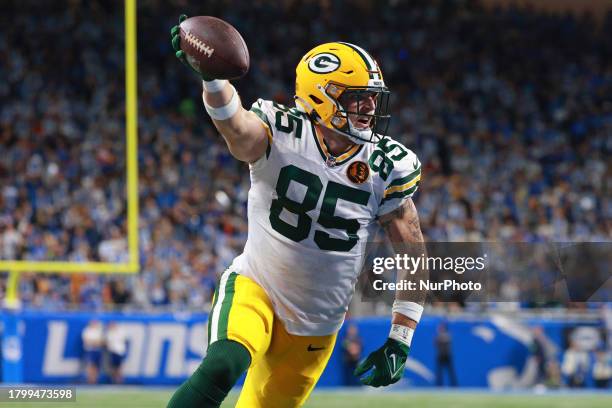 Green Bay Packers tight end Tucker Kraft scores a touchdown during the first half of an NFL football game between the Green Bay Packers and the...