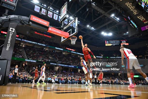 Max Strus of the Cleveland Cavaliers dunks over Ausar Thompson of the Detroit Pistons during the second quarter of an NBA In-Season Tournament at...