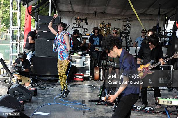 Singer Karen O and musician Nick Zinner of the Yeah Yeah Yeahs perform on stage during Bonnaroo 2009 on June 12, 2009 in Manchester, Tennessee.