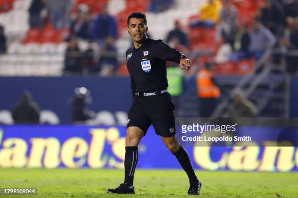 Adonai Escobedo referee of the match gestures during the Play-in match between Atletico San Luis and Leon as part of the Torneo Apertura 2023 Liga MX...