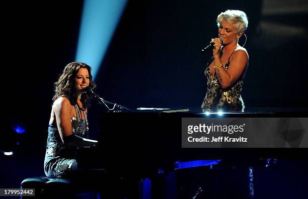 Musician Sarah McLaughlin and singer Pink onstage during the 2008 American Music Awards held at Nokia Theatre L.A. LIVE on November 23, 2008 in Los...