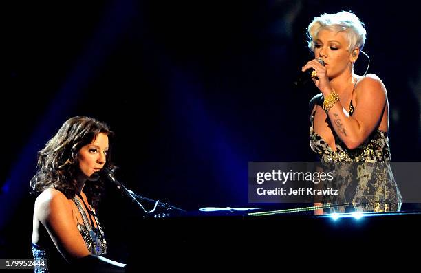 Musician Sarah McLaughlin and singer Pink onstage during the 2008 American Music Awards held at Nokia Theatre L.A. LIVE on November 23, 2008 in Los...