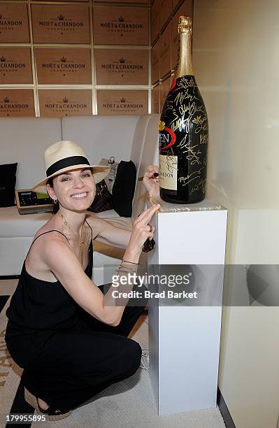 Actor Julianna Margulies attends The Moet & Chandon Suite at USTA Billie Jean King National Tennis Center on September 7, 2013 in New York City.