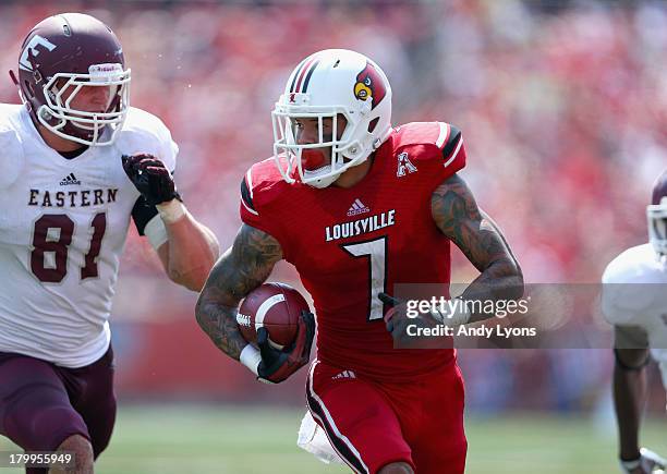 Damian Copeland of the Louisville Cardinals runs with the ball during the game against the Eastern Kentucky Colonels at Papa John's Cardinal Stadium...