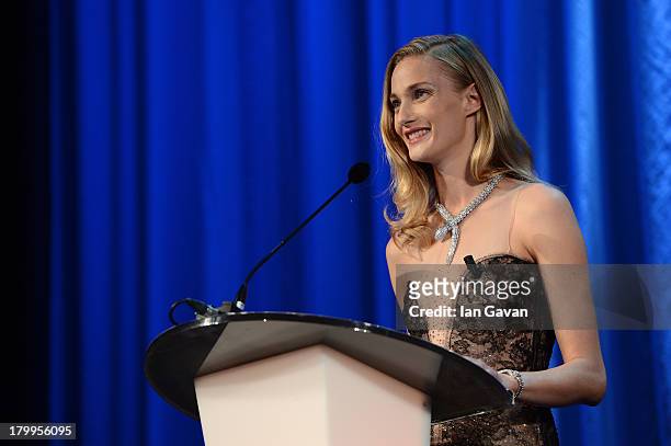 Festival hostess Eva Riccobono wears a Jaeger-LeCoultre Vintage Couvercle watch as she speaks on stage during the Award Ceremony at the 70th Venice...